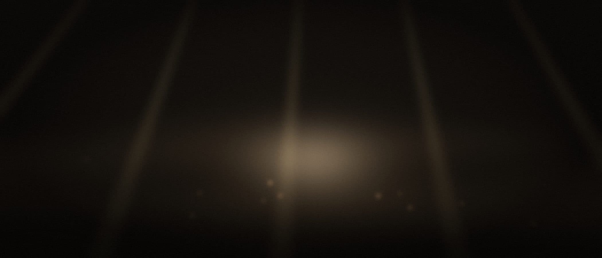 a rig of light beams over a bright peak-moment bloom on a crowded dance floor